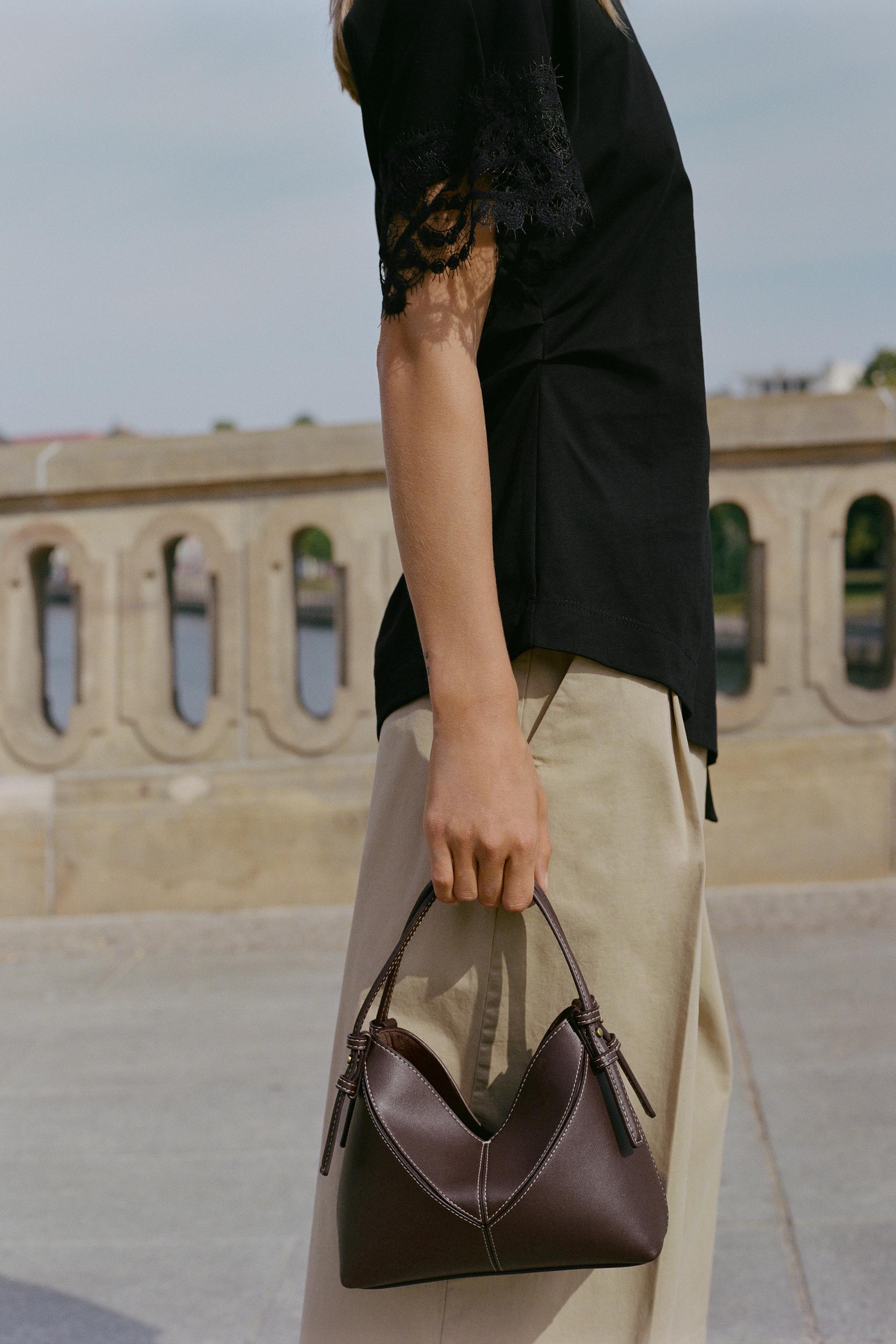 MINI BUCKET BAG WITH TOPSTITCHING