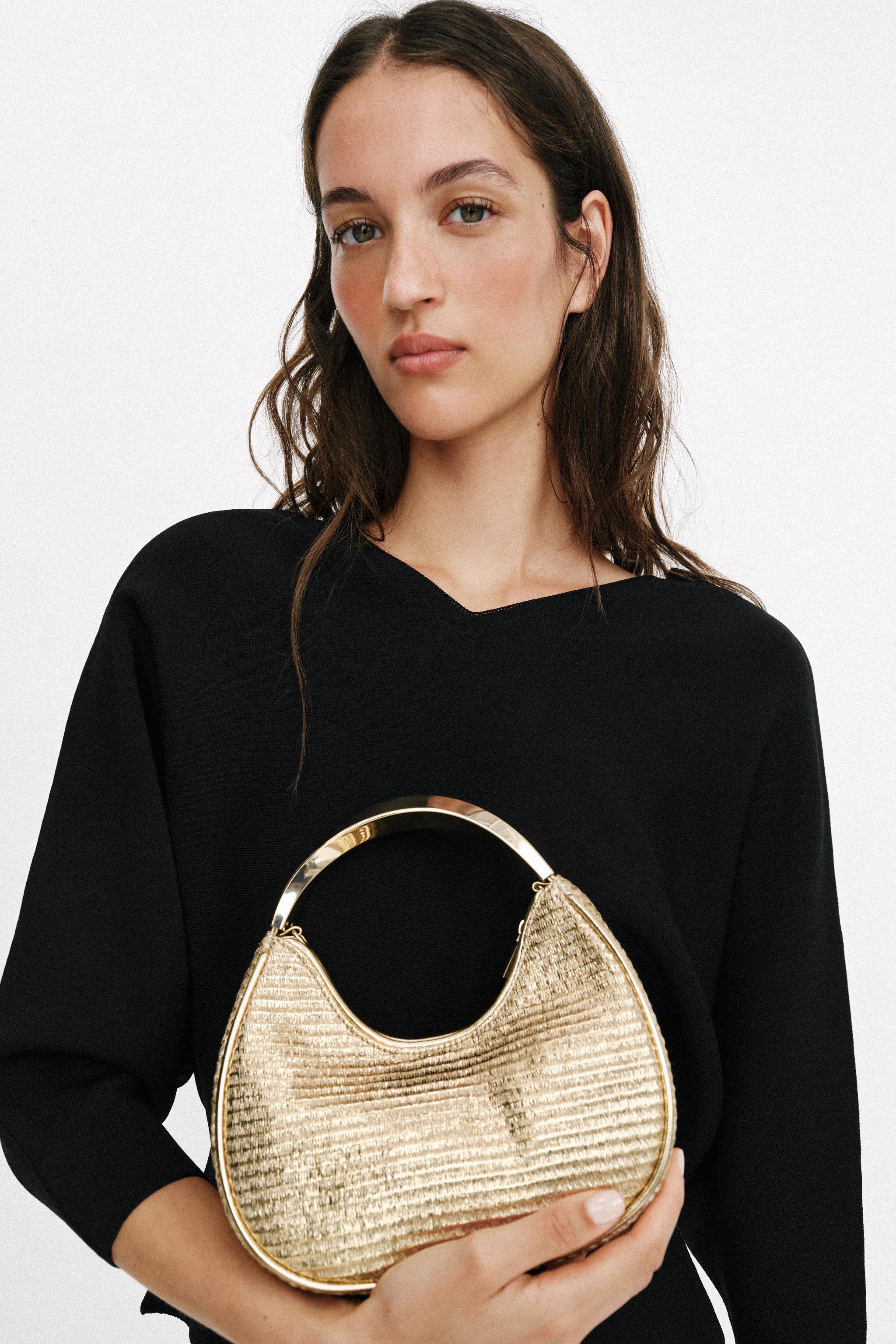 METALLIC HANDLE DETAIL BAG